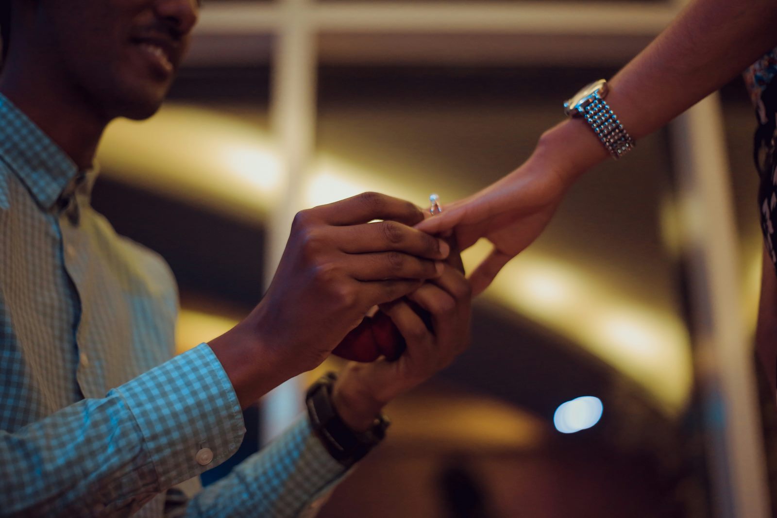 Young couple sharing a quiet moment at home, not in formal wedding attire