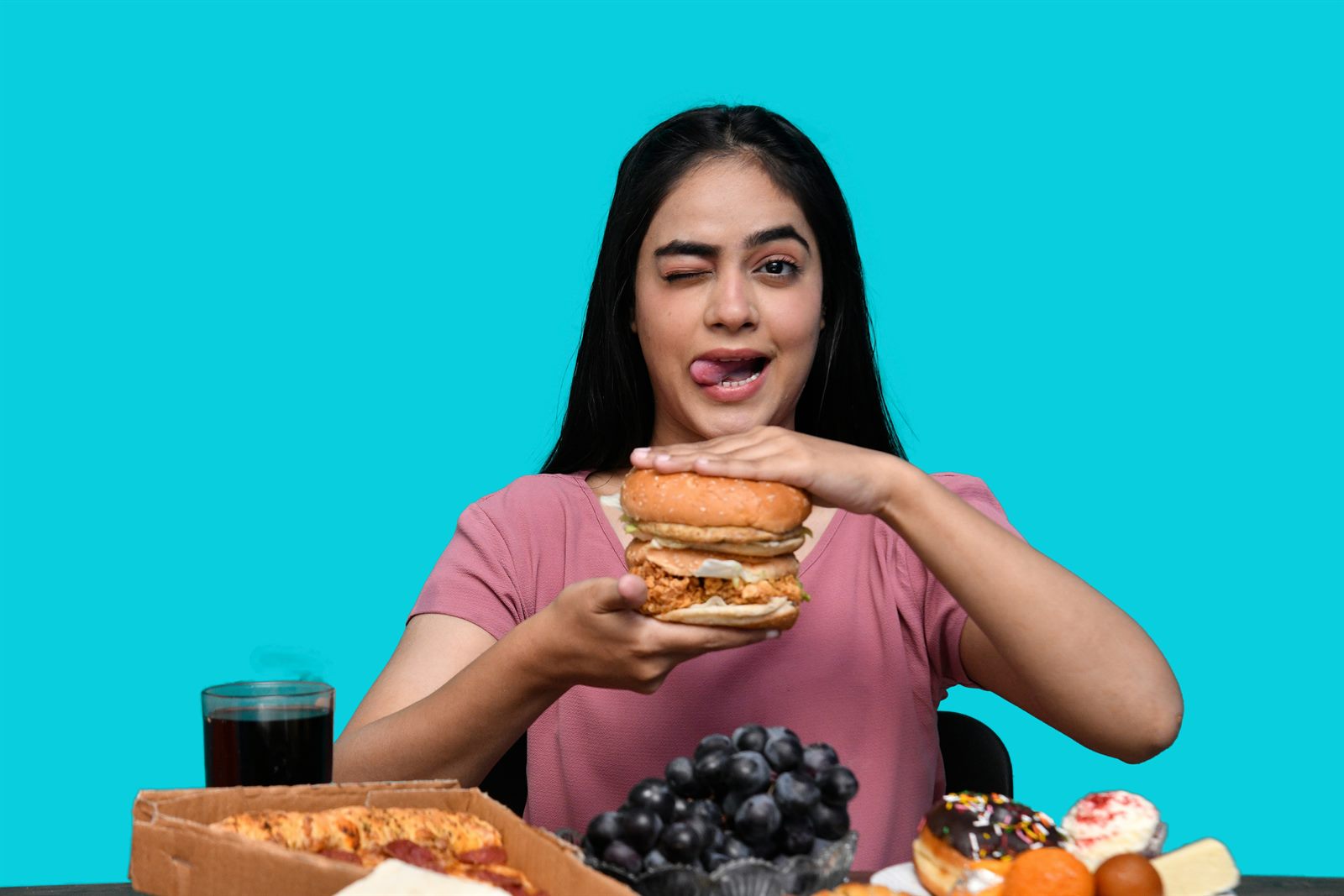 A fresh market stall of vegetables and whole foods contrasted with a display of packaged snacks nearby